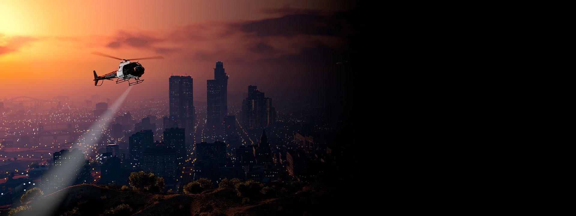 A helicopter flies over a city at dusk.