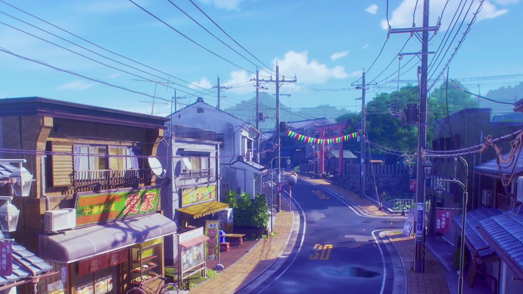 A sunny neighborhood street in Japan with a festive banner hanging from two telephone poles.
