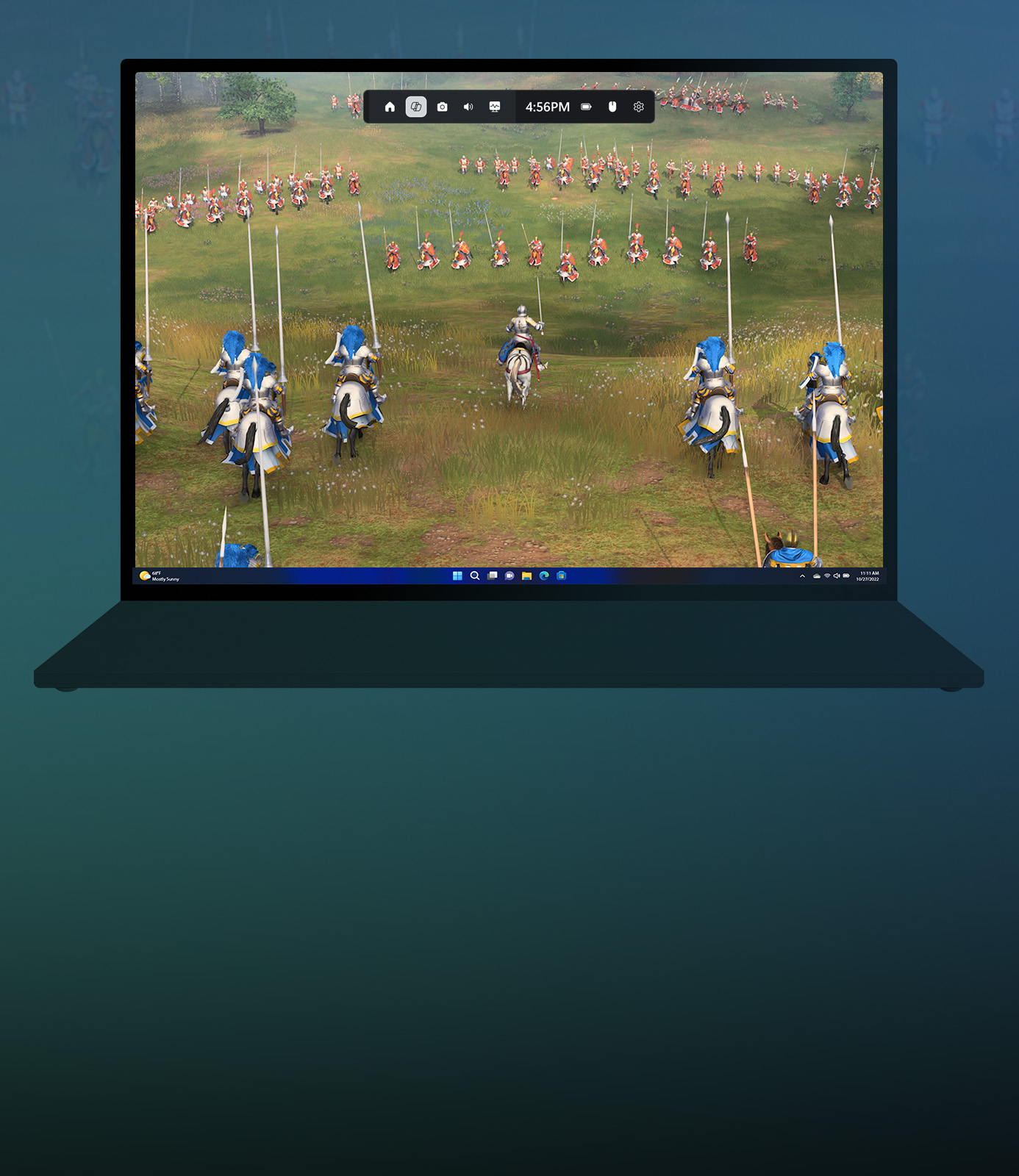 A laptop with Age of Empires IV gameplay and Game Bar present at the top of the screen.