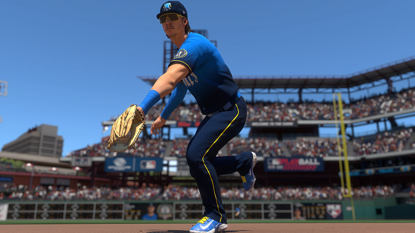 update main gallery with image: A player wearing a Philadelphia Phillies jersey reaching down to catch the ball.