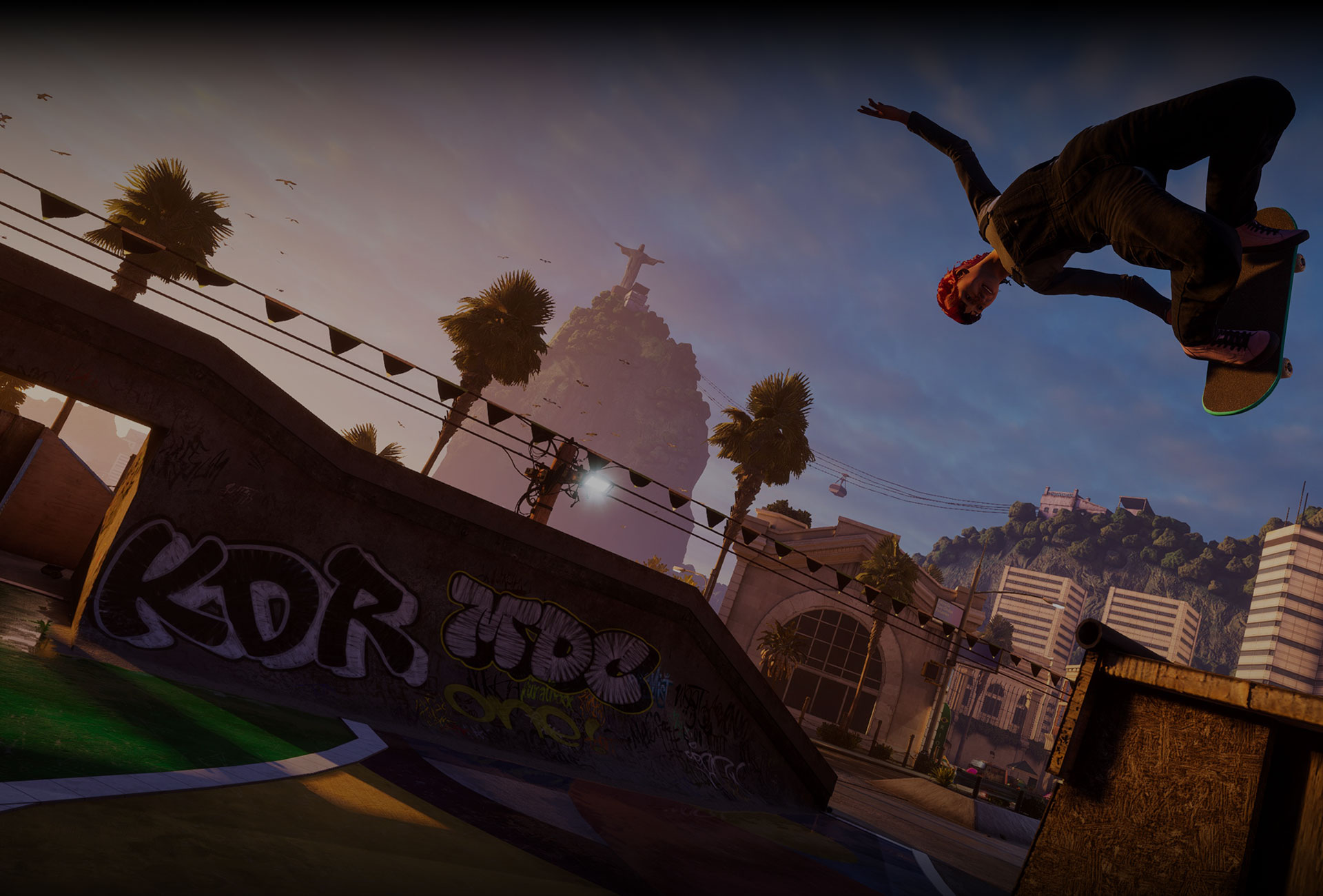 Tony Hawk's Pro Skater 3+4 - Tony Hawk leaps off the edge of a bowl in an industrial warehouse.