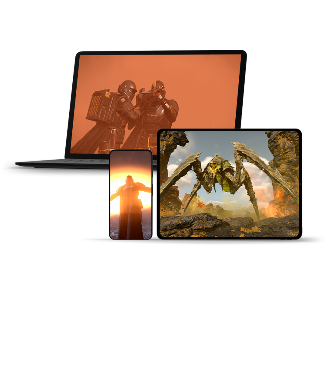 front view of three different monitor screens displaying Helldivers 2 gameplay