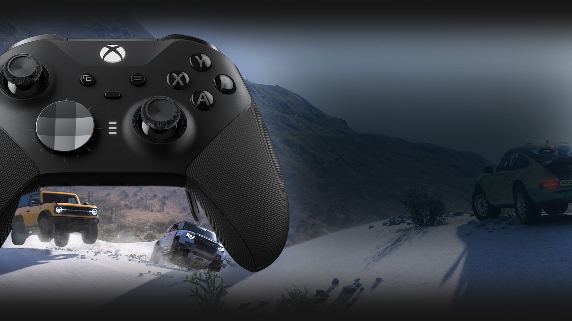 A Ford Bronco and Land Rover Defender race through the snow underneath the Xbox Elite Wireless Controller Series 2.