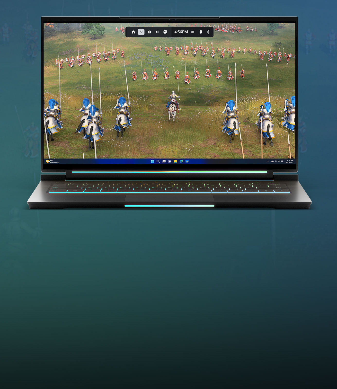 A laptop with Age of Empires IV gameplay and Game Bar present at the top of the screen.