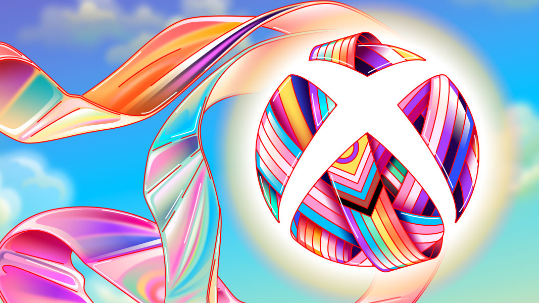 Xbox logo wrapped in a ribbon of Pride colors against a cloudy blue sky