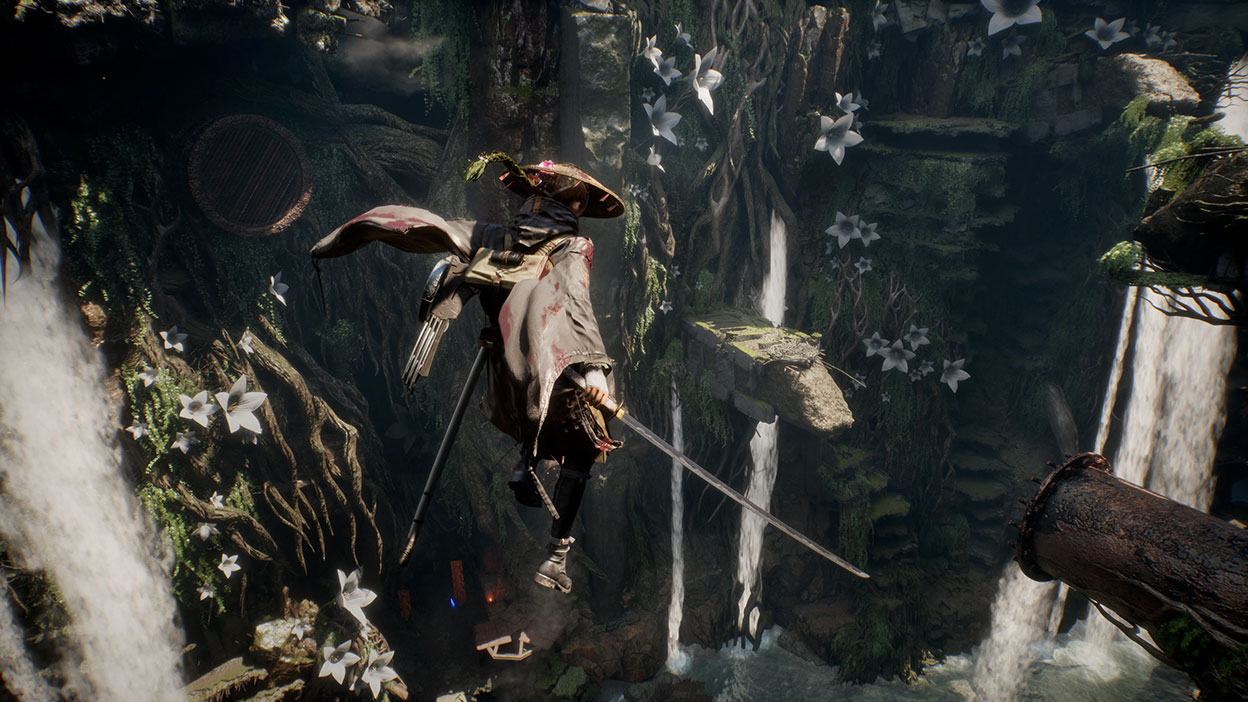 エマは、剣を手にしたまま、流れ落ちる水に囲まれた岩棚を飛び越える。