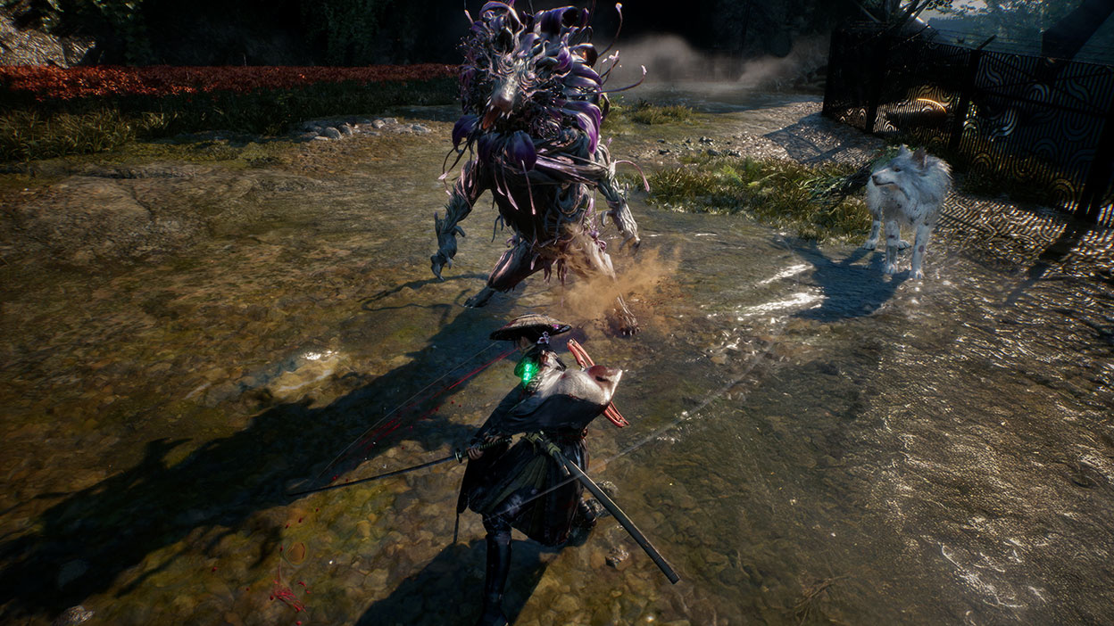 エマとクゥは、浅瀬で、紫の花のたてがみを持つ獣と戦う。 