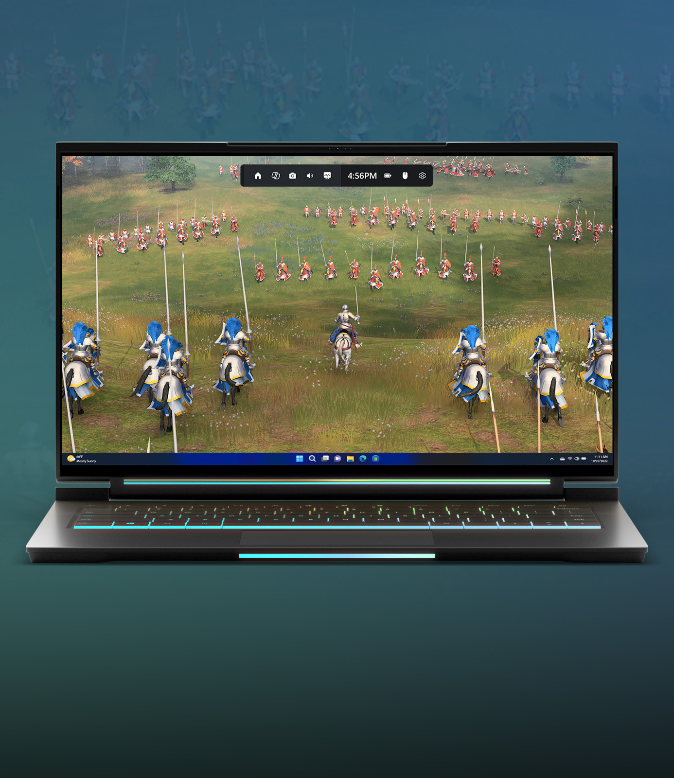 A laptop with Age of Empires IV gameplay and Game Bar present at the top of the screen.