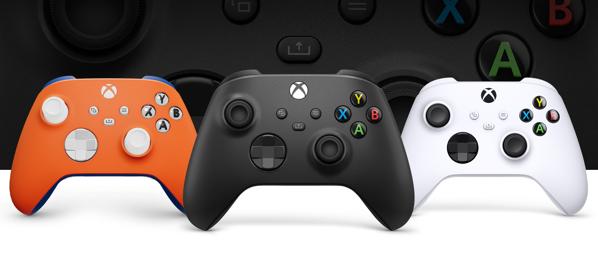 Xbox Carbon Black controller in front with Xbox Design Lab customizable controller on left and Robot White on right