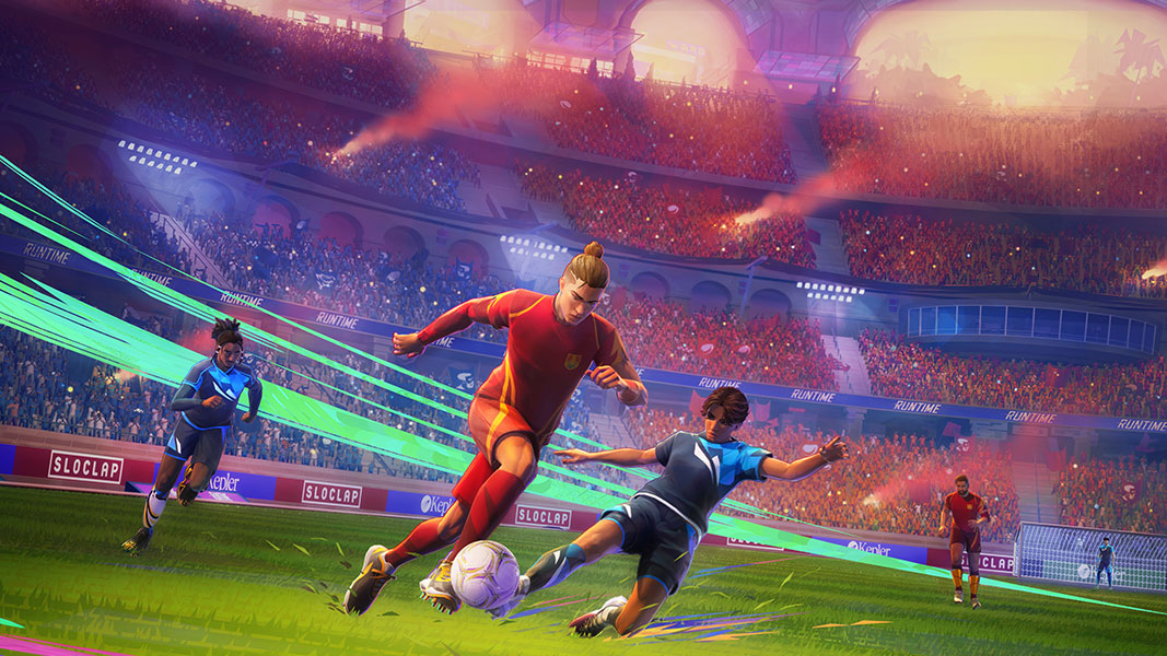 Two footballers race down a field in a packed stadium, one dribbling the ball while the other is attempting a slide tackle