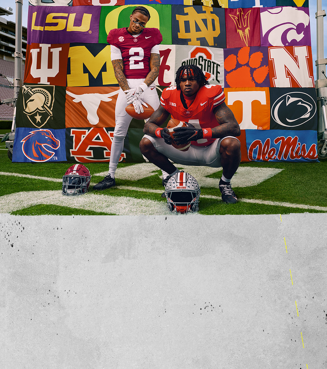 American football players posing on a football field in front of a banner featuring dozens of US college team logos.