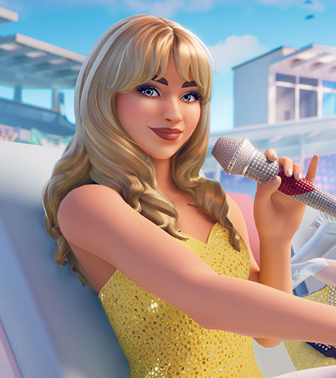 Sabrina Carpenter smiles while sitting on a beach chair and holding a microphone.