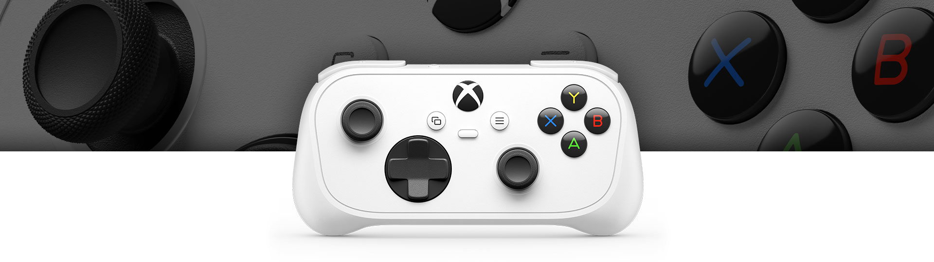 Front view of XBOX Nano Controller with close-up view in the background.