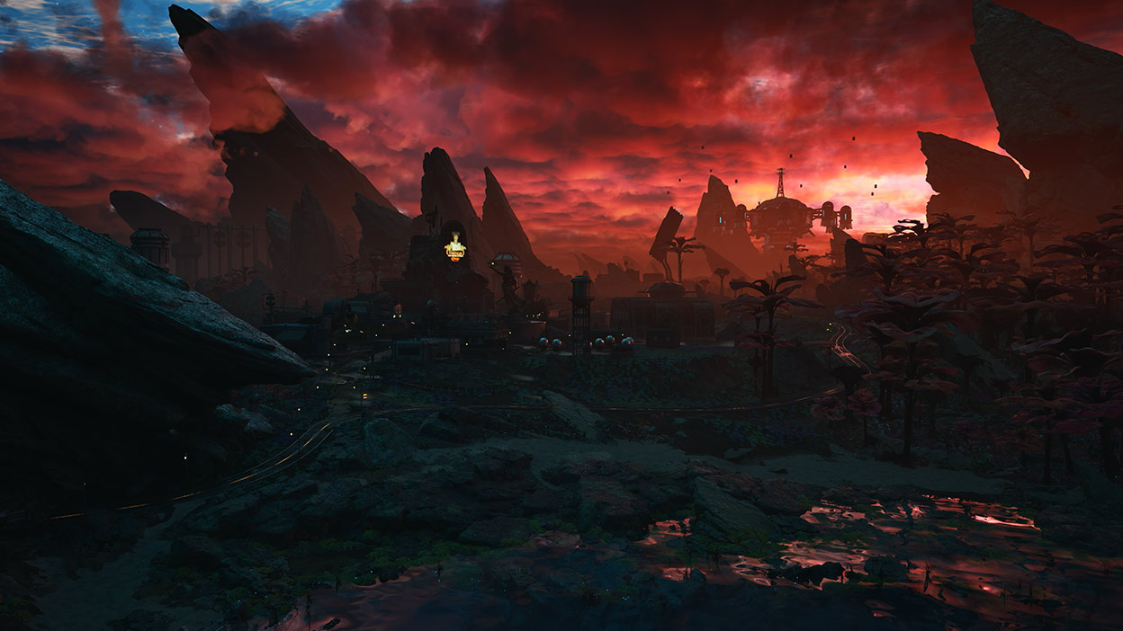 At sunset, a futuristic city shines dimly on the edge of a jungle and rocky mountaintops.