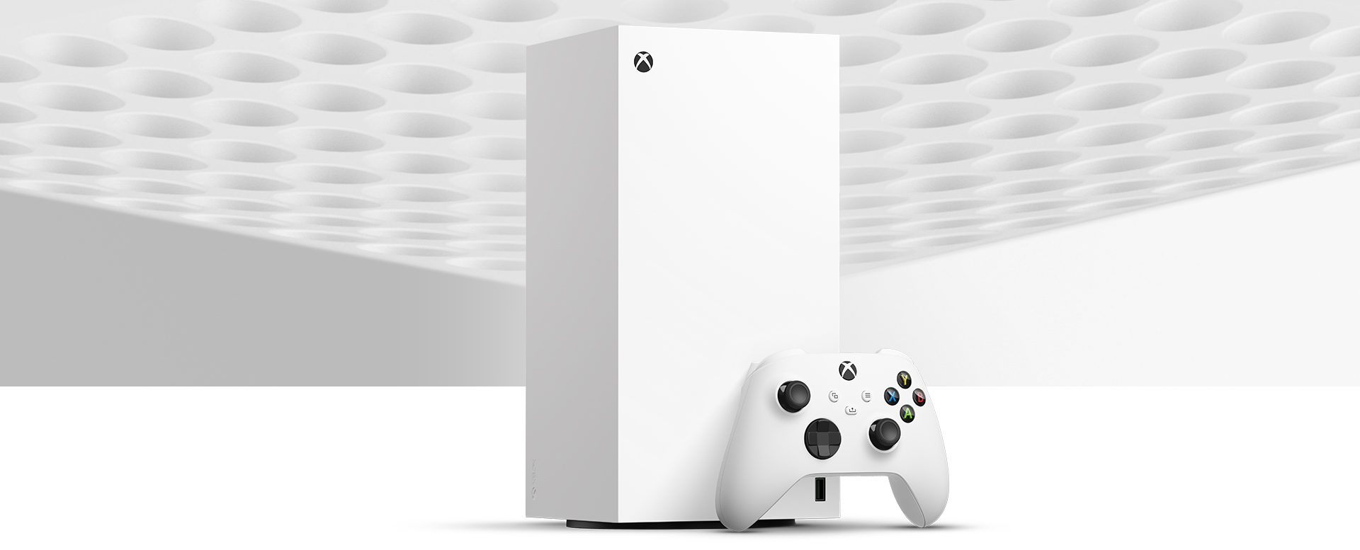 Xbox Series X Digital Edition in front of the top fan on the Xbox Series X with a Robot White Xbox Wireless Controller.