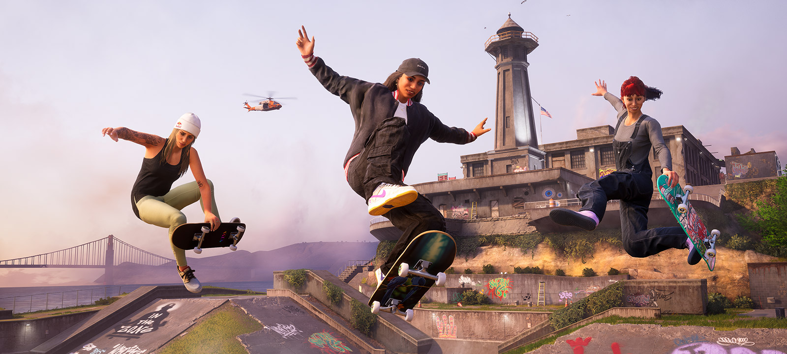 On Alcatraz Island, three skaters perform midair tricks while a helicopter flies overhead.