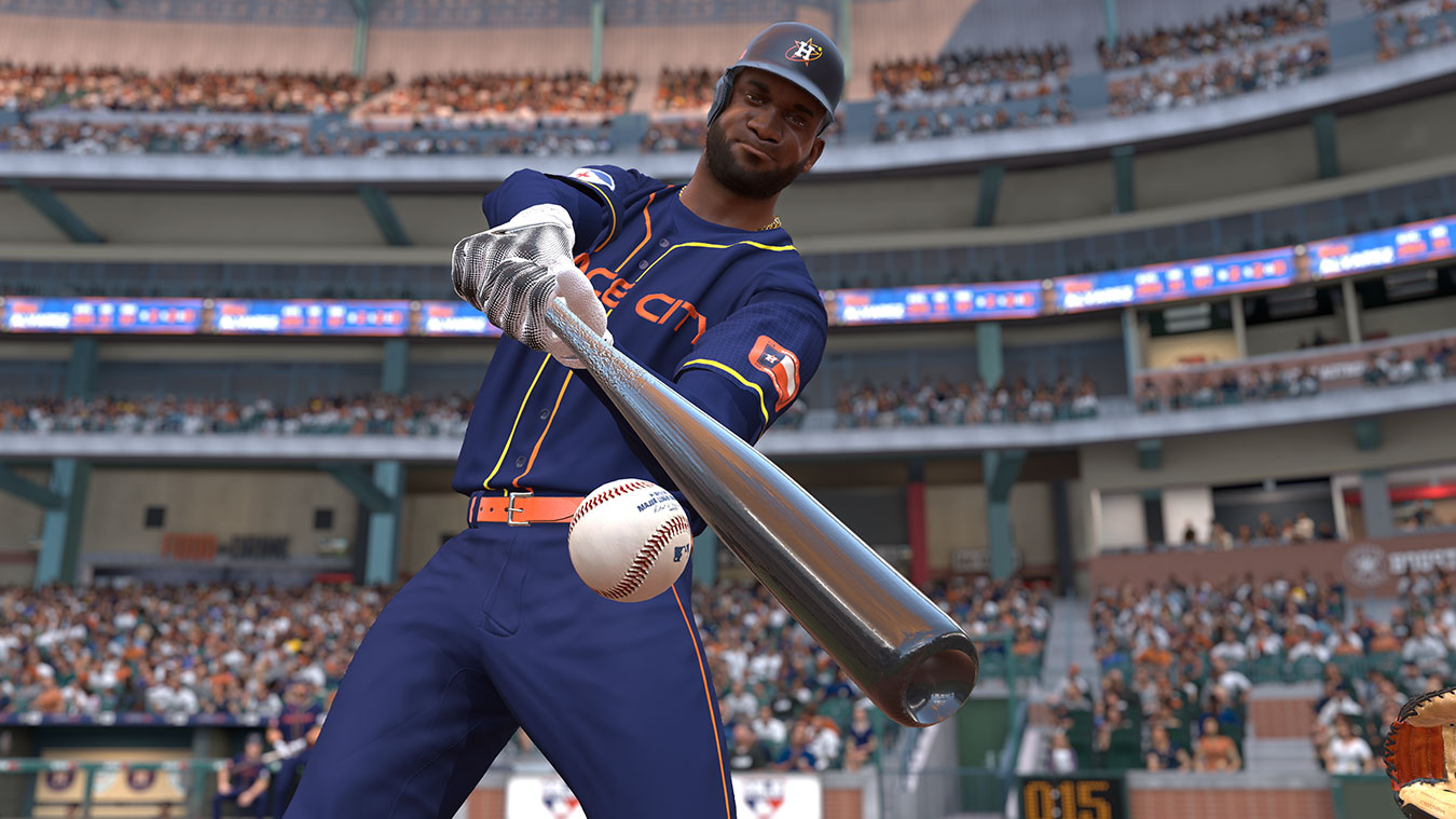 update main gallery with image: A Houston Astros player swinging a bat to hit the ball.