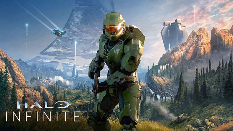 Master Chief kijkt recht vooruit in een weelderige vallei met achter zich een gebroken Halo ring