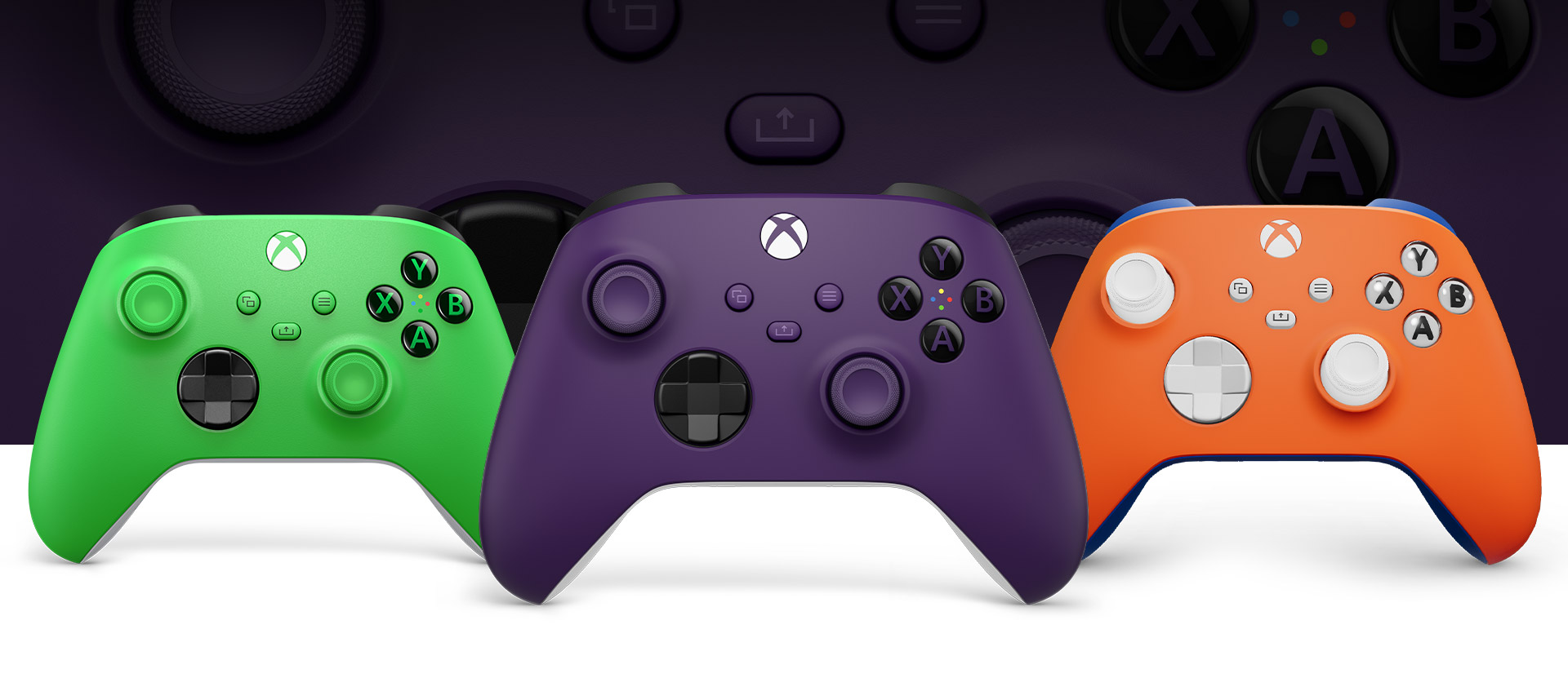 Xbox Purple controller in front with Green on left and Xbox Design Lab customizable controller on right 
