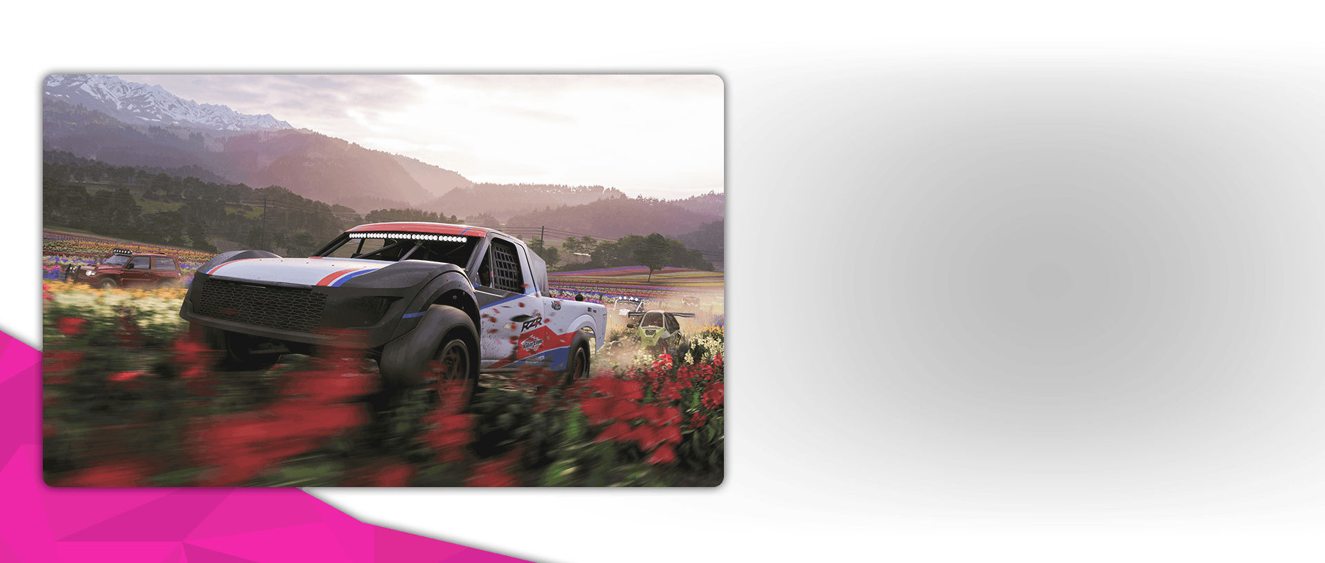 A RZR Pro 4 Truck dives offroad through a field of flowers alongside a group of other vehicles.